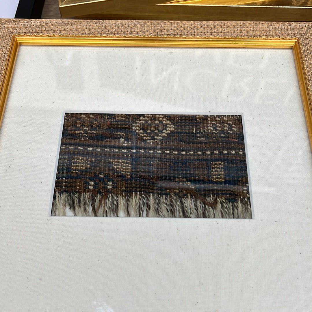Woven fabric in antique frame