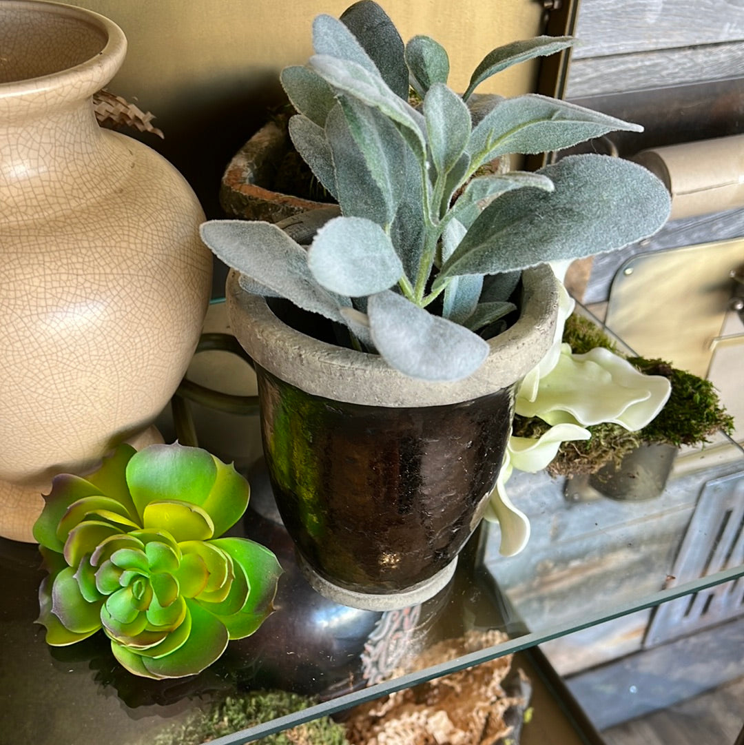 Ceramic planter with bronze
