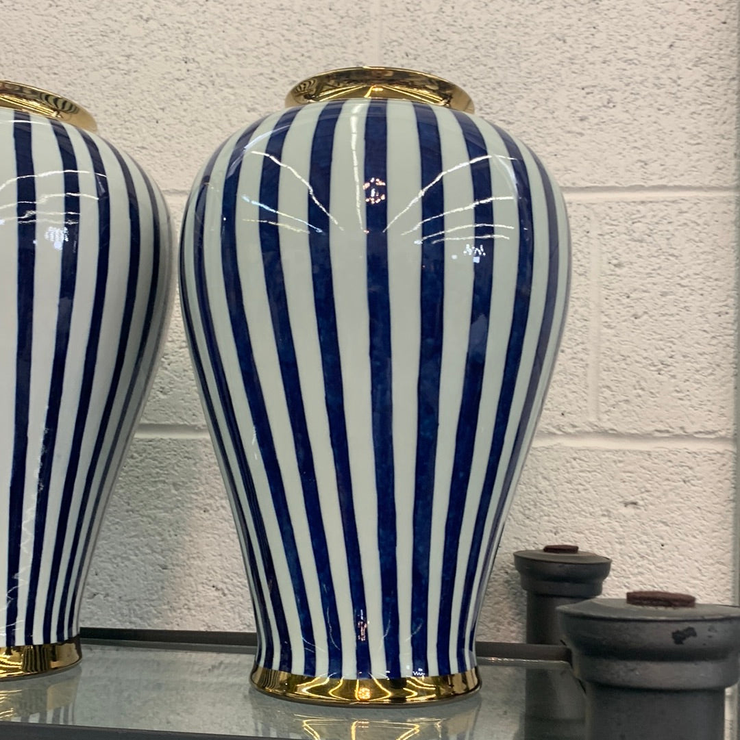 Blue and white striped vase with gold