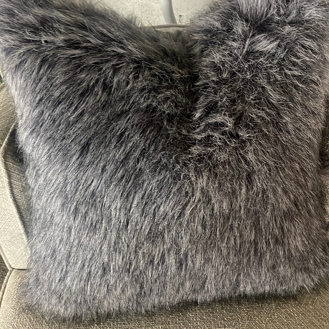 Purple furry pillow