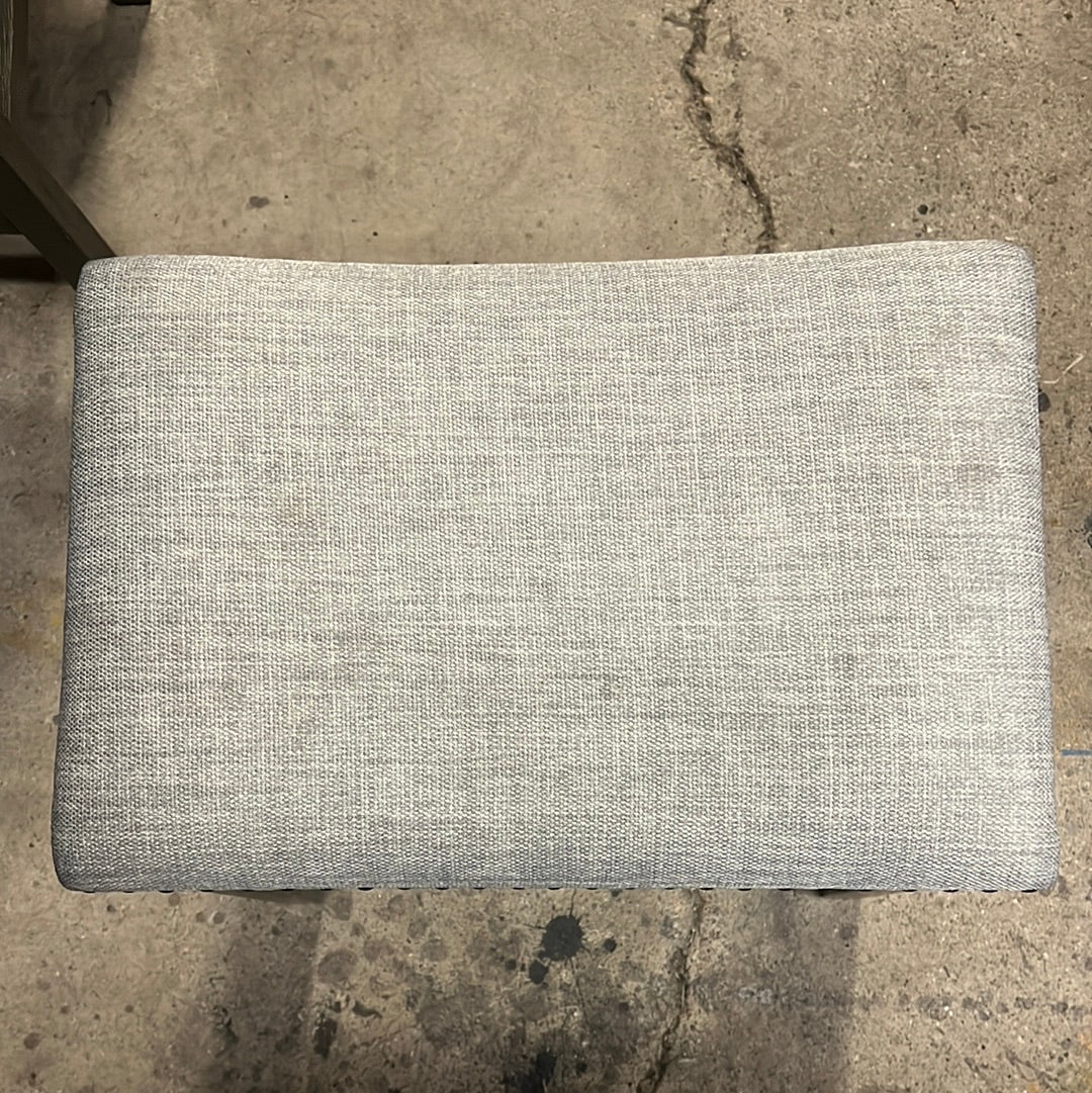 Grey upholstered counter stool