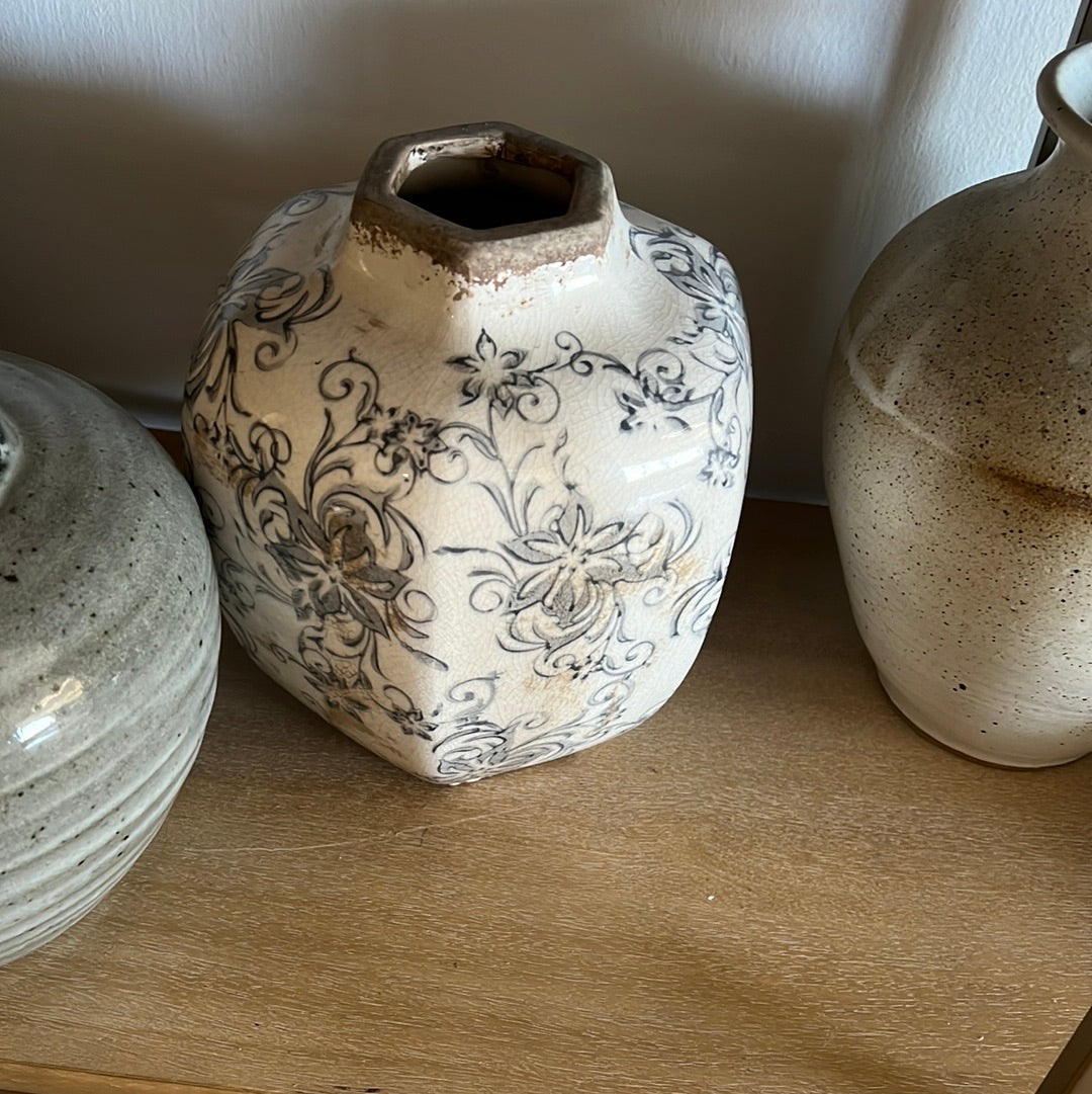 Weathered white floral vase