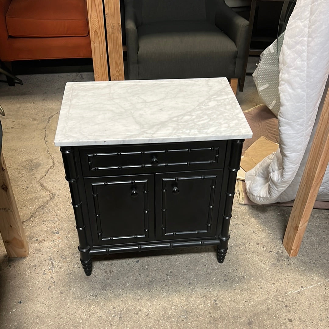 Black night stand with marble top