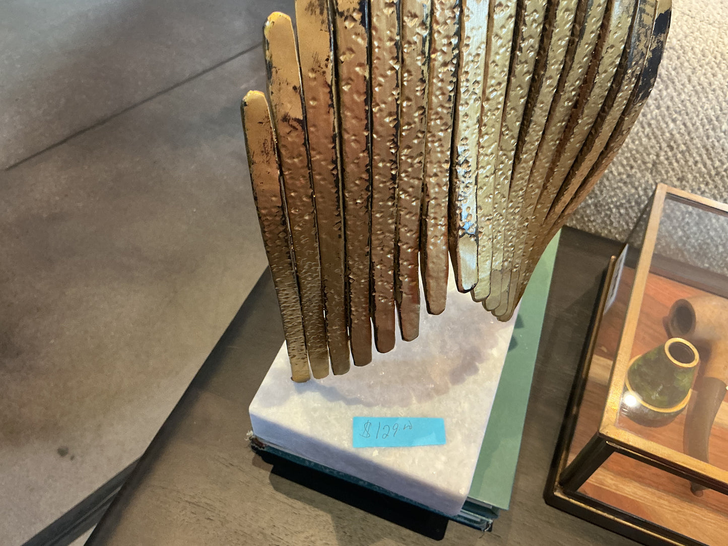 Gold sculpture with Marble base