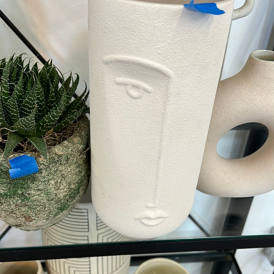Half face vase