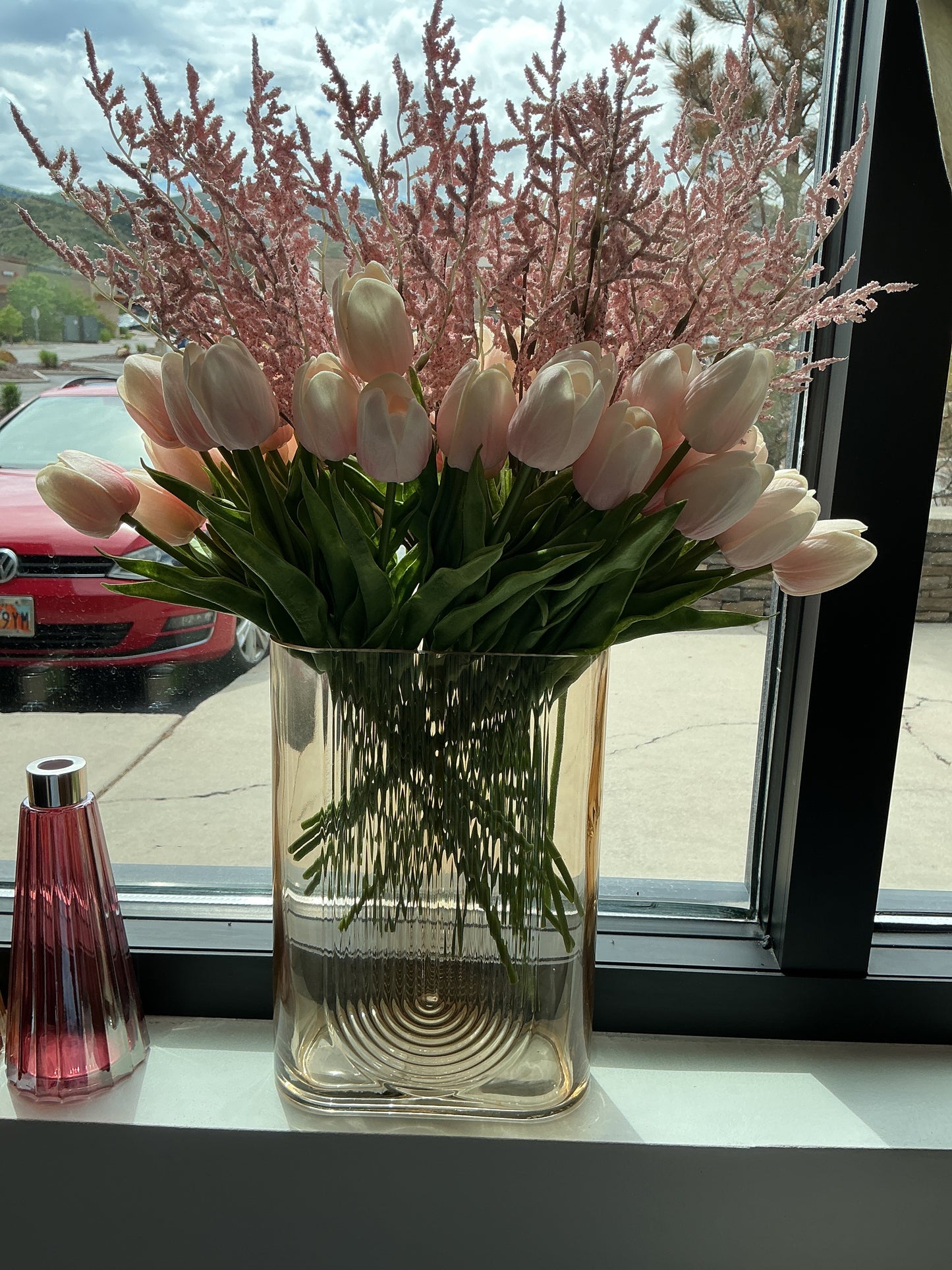 Clear rectangular Vase with Tulip arrangement