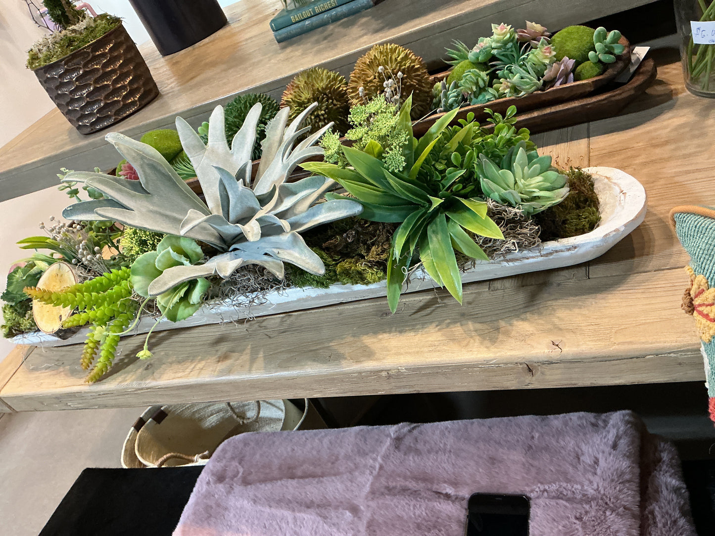 Artificial plants on long wood white tray