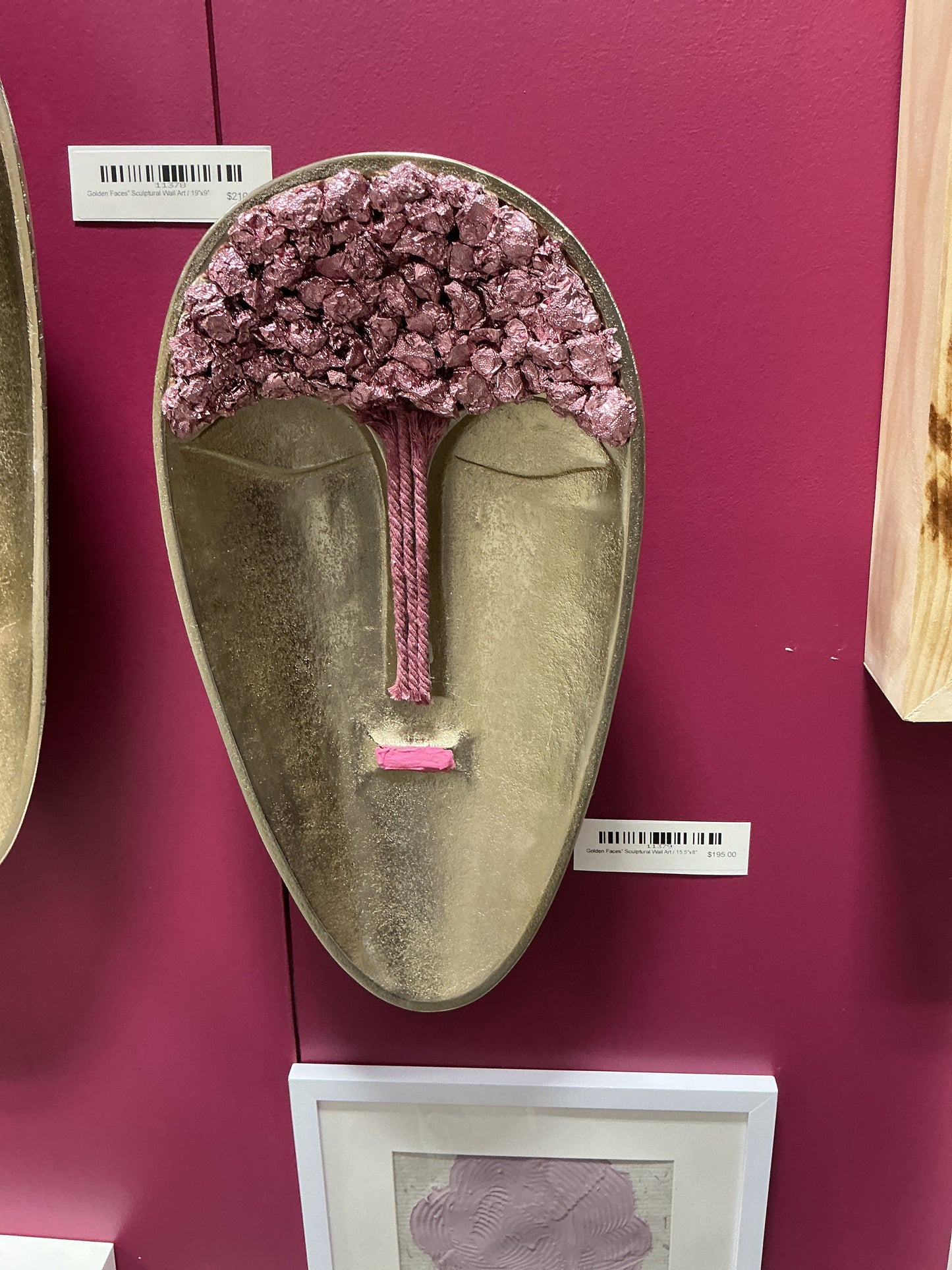 Golden faces sculptural wall art