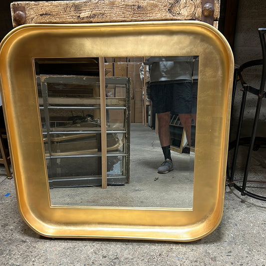 Wide gold frame mirror