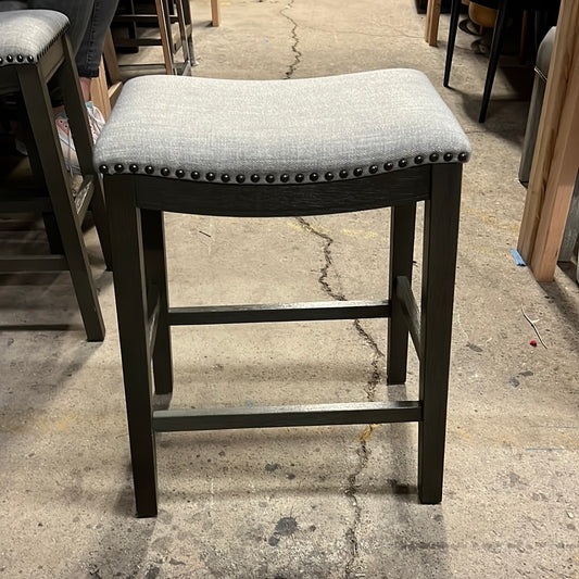 Grey upholstered counter stool