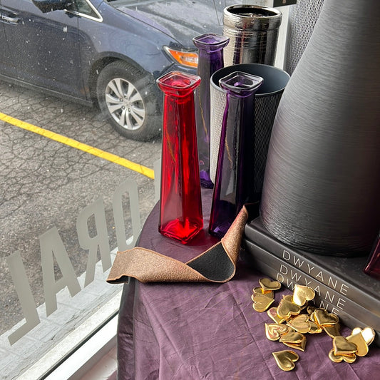 Pink, red, and purple vases