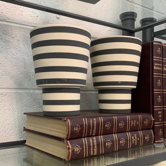 Ceramic vase with black stripes
