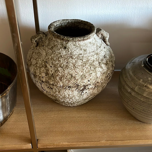 Weathered ceramic vase