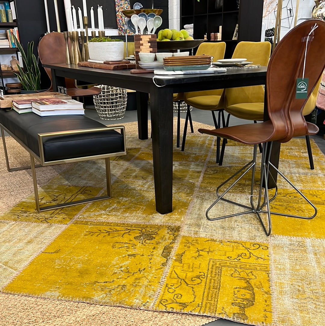 Stitched yellow rug