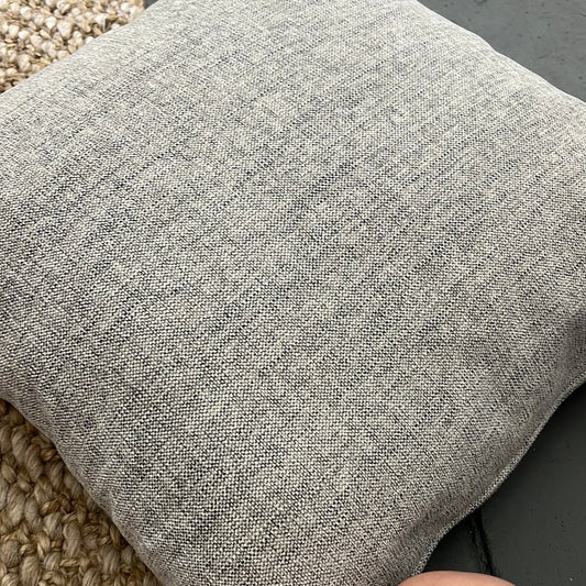 Grey throw pillow