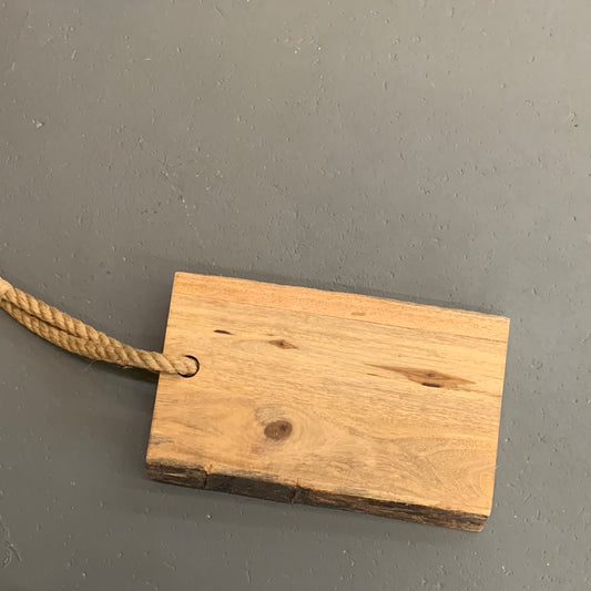 Wood charcuterie board with rope