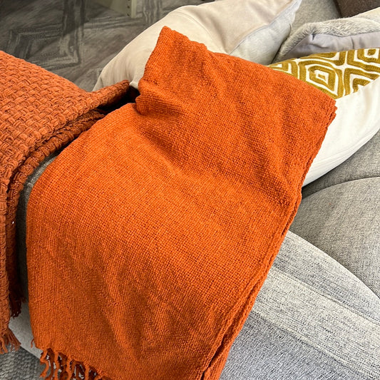 Orange throw blanket