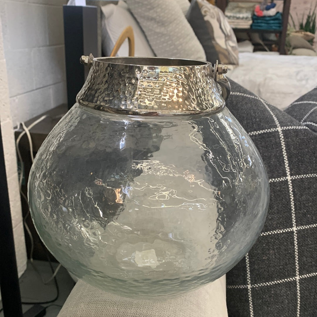 Large glass vase with metal top