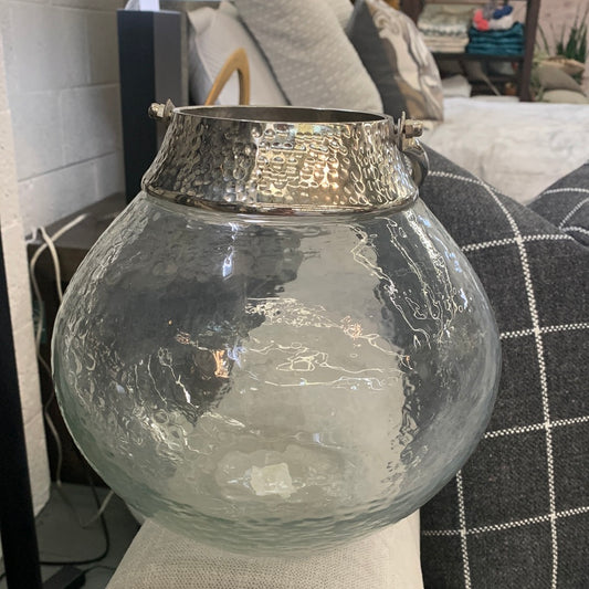 Large glass vase with metal top