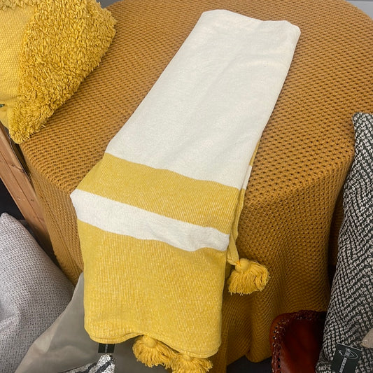 Yellow throw blanket